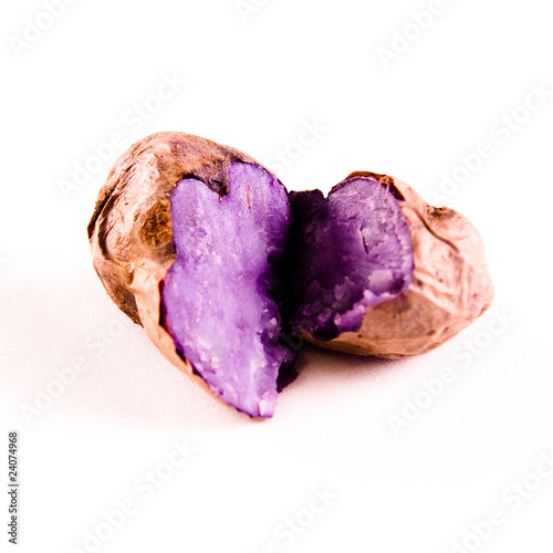 A purple potato on white background