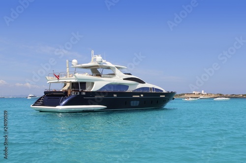 luxury yacht in turquoise Illetes Formentera photo