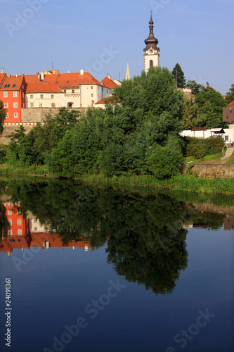 The colorful medieval town Pisek in Czech above the river Otava