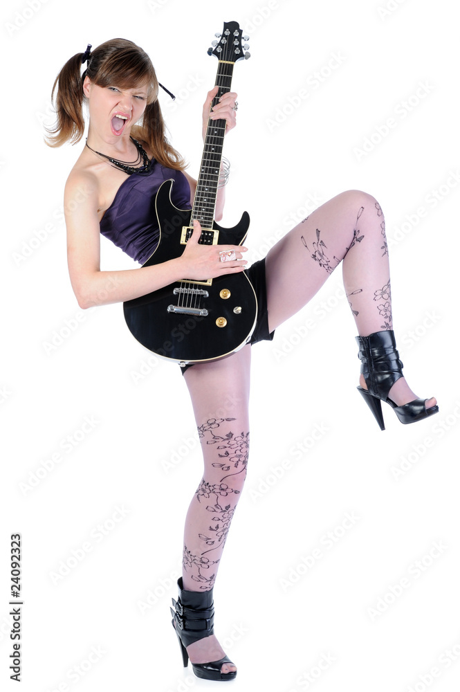 girl with a black guitar in his hand. girl with a black guitar in his hand.