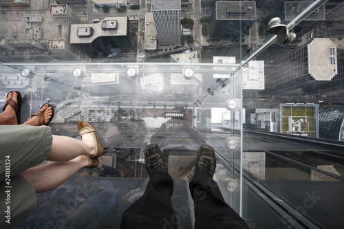 Looking down from the clear viewing platform of a Chicago skyscraper  building