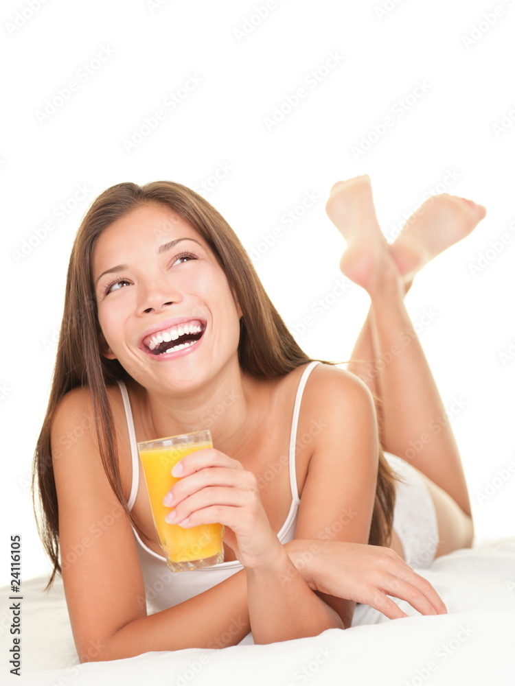 Woman in bed drinking Juice Woman in bed drinking Juice