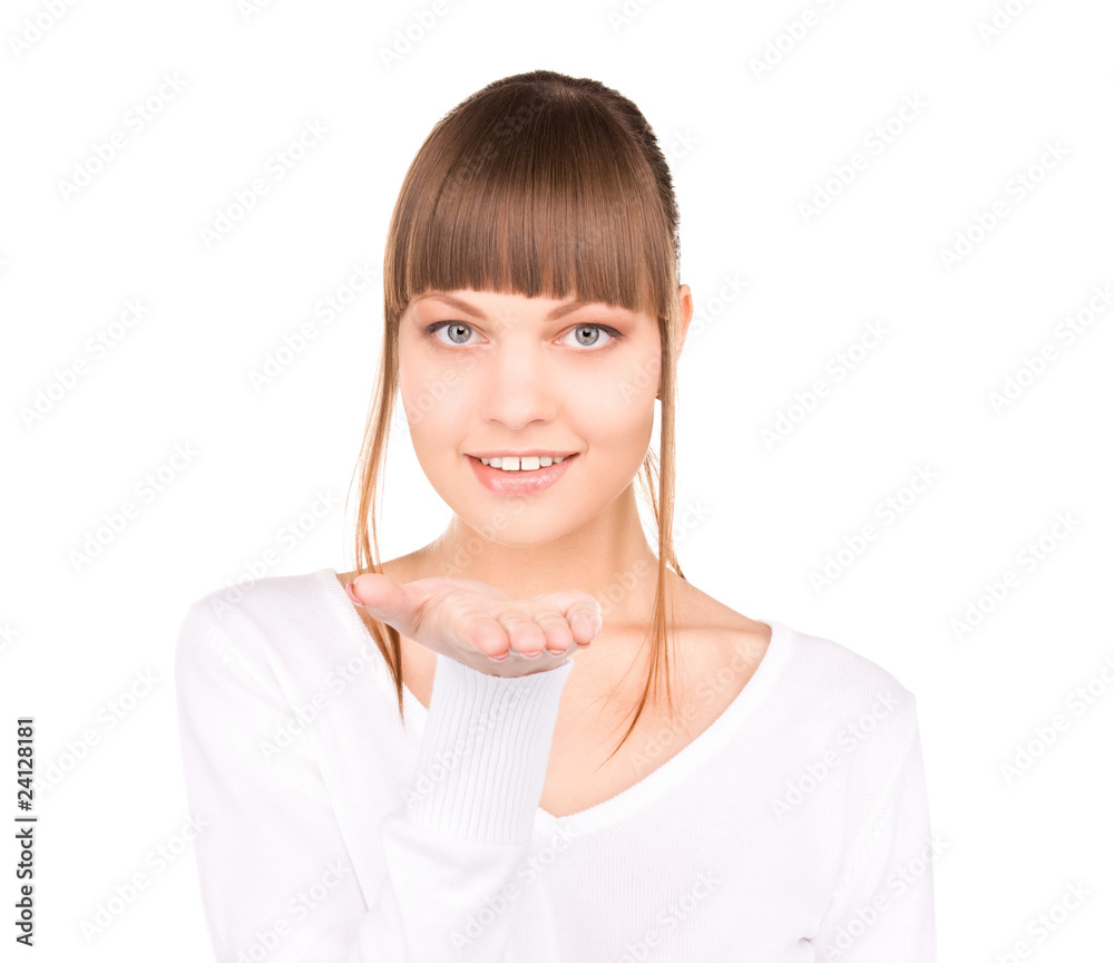 beautiful woman holding something on the palm of her hand beautiful woman holding something on the palm of her hand
