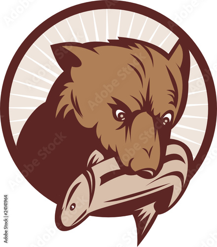 Brown bear with trout salmon fish