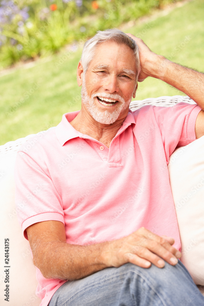 Senior Man Relaxing In Garden Senior Man Relaxing In Garden