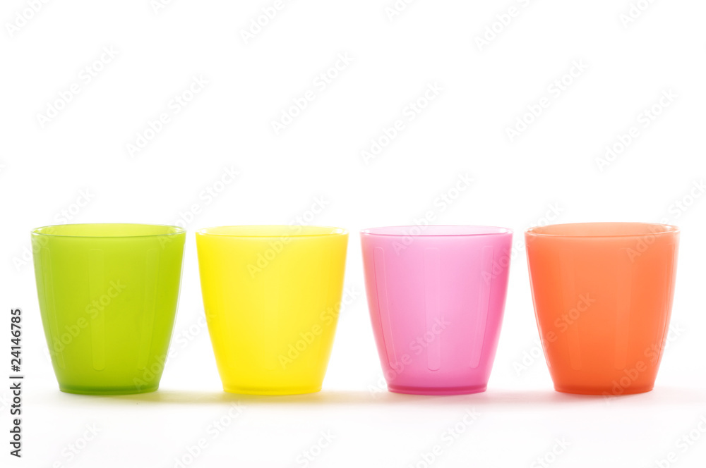 Plastic cups of various colours isolated on white Plastic cups of various colours isolated on white