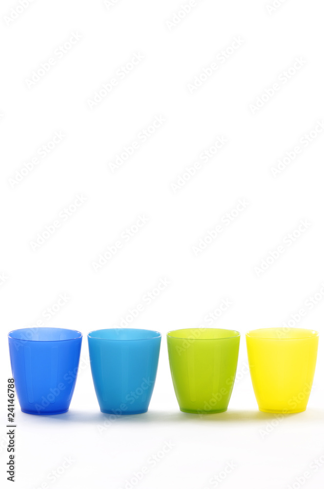 Plastic cups of various colours isolated on white Plastic cups of various colours isolated on white