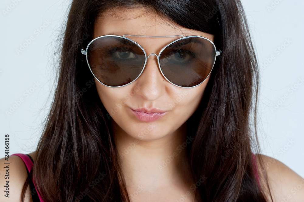 Fashion portrait of young pretty woman with glasses Fashion portrait of young pretty woman with glasses