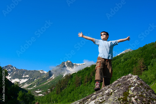 Hiker in Caucasus mountains