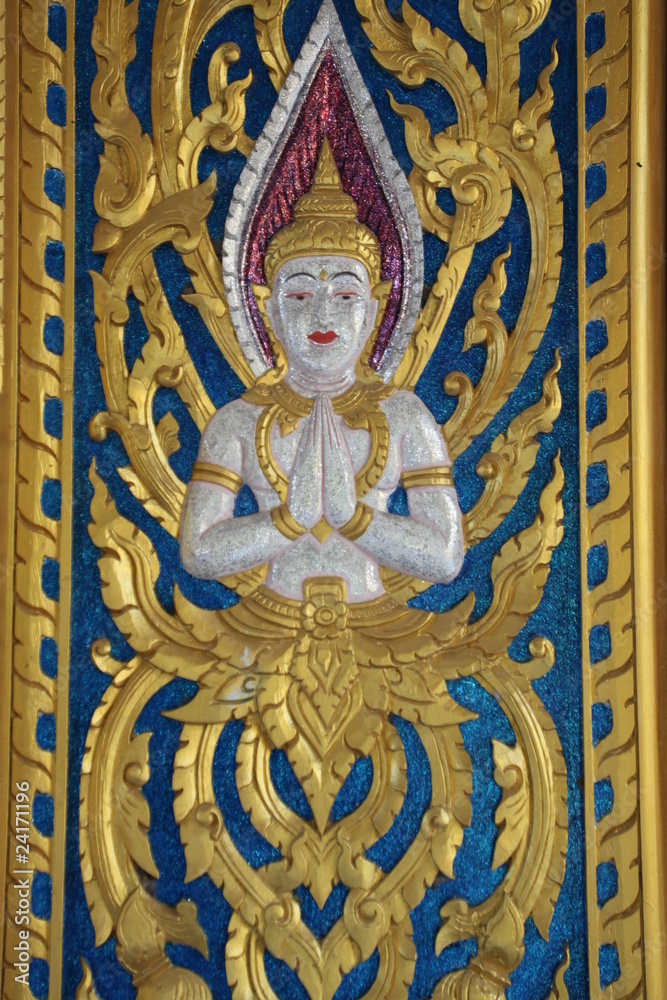 art carving on door of stupa, Wat Rahan, Ban Dan, Buriram
