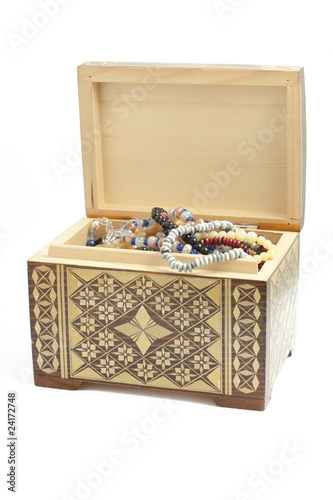 Small opened chest with jewellery