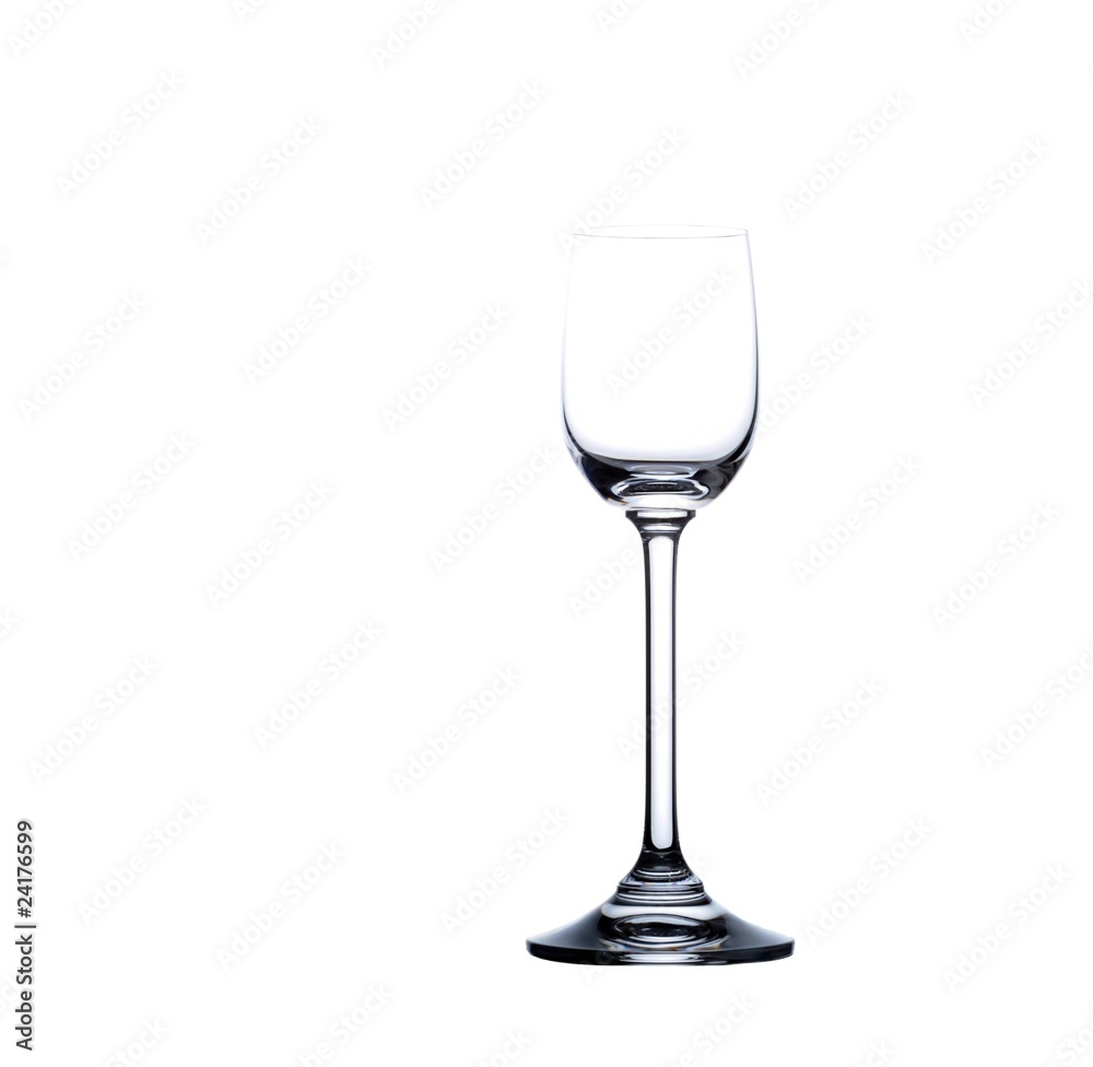 Empty liquor glass isolated over white Empty liquor glass isolated over white