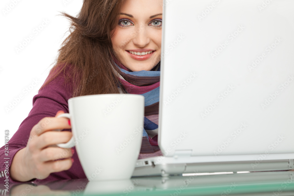 Young woman smilinglaptop Young woman smilinglaptop