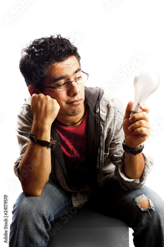 bored student waiting for an idea with lightbulb in hand