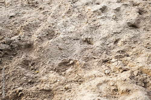 backwashed sand of horse manege close-up photo