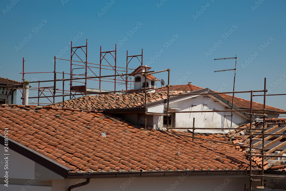 Scaffold and a the Broken Roof of an House