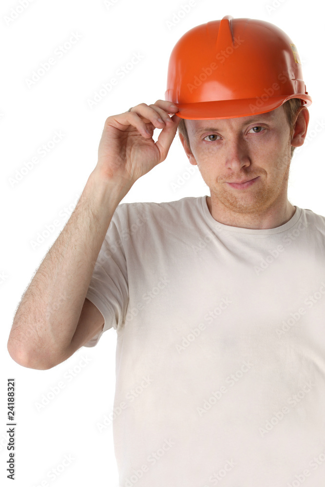 Studio portrait of a happy handyman in orange helmet