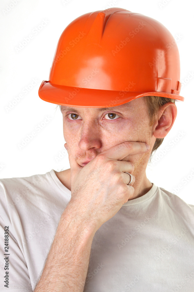 brooding architect engineer in orange construction helmet brooding architect engineer in orange construction helmet