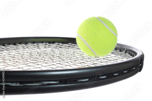 Balle sur une raquette de tennis © Sébastien Garcia