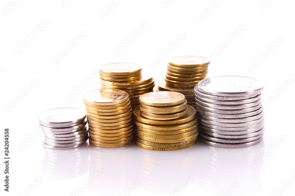 Many coins in column isolated on white Many coins in column isolated on white