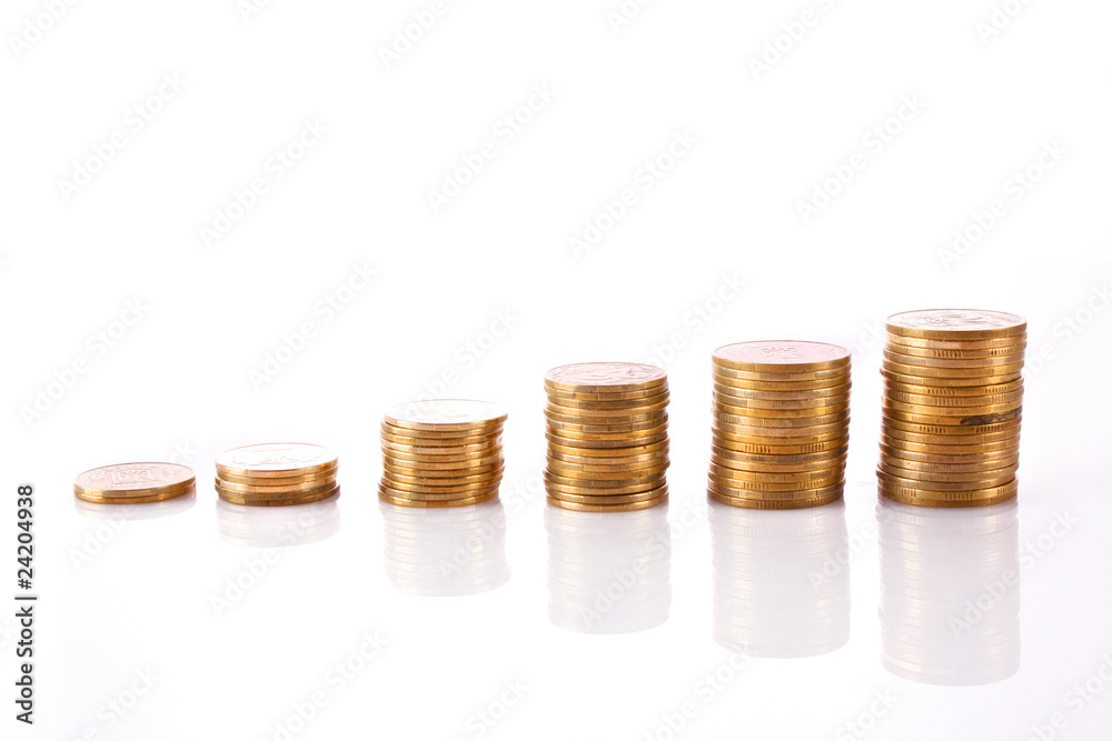 Many coins in column isolated on white Many coins in column isolated on white