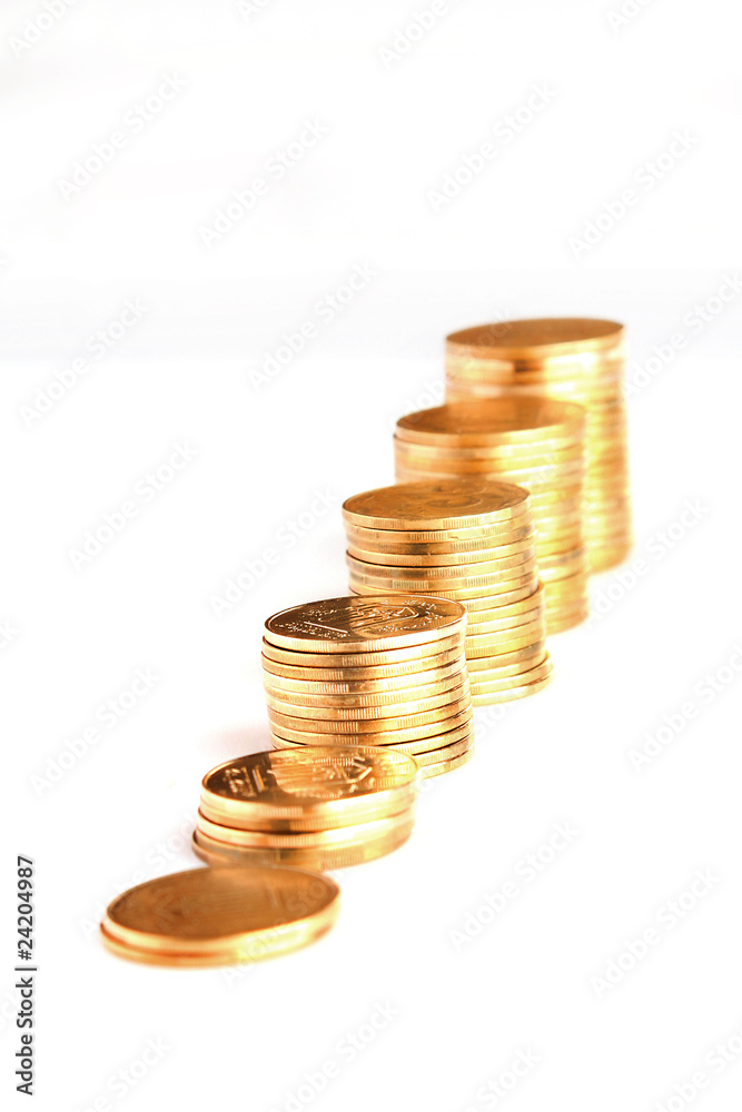 Many coins in column isolated on white Many coins in column isolated on white