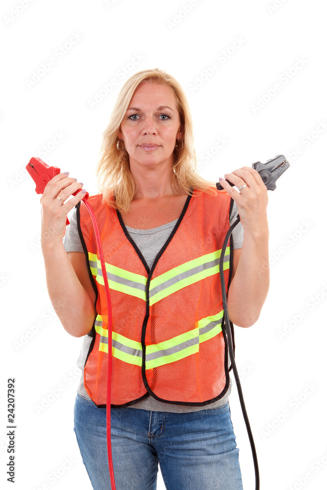 woman in safety vest over white background woman in safety vest over white background