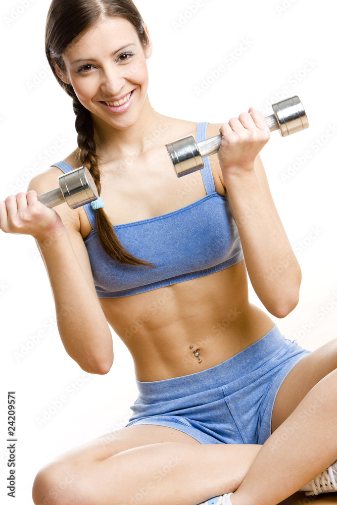 woman with dumb bells at gym woman with dumb bells at gym