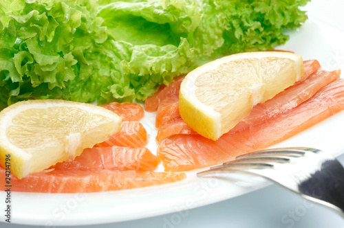 Salted salmon on white plate.