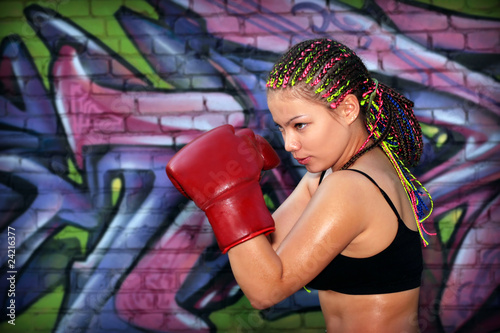 Girl with red boxing gloves