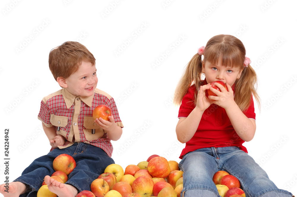 Children with apples on a white background Children with apples on a white background