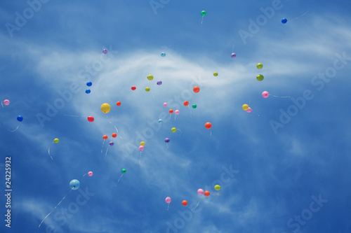 multicoloured balloons in the blue sky