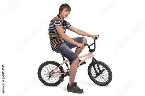 beautiful guy sits on bicycle