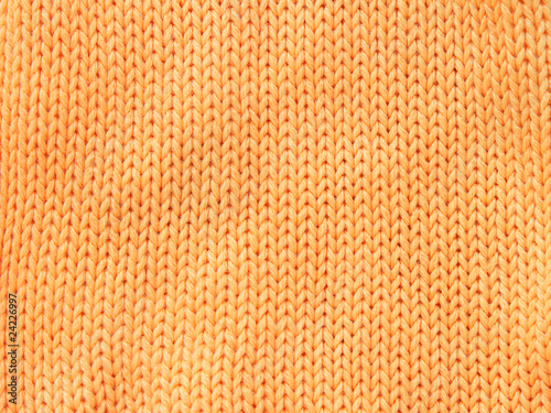 Closeup photo of the orange woolen cloth