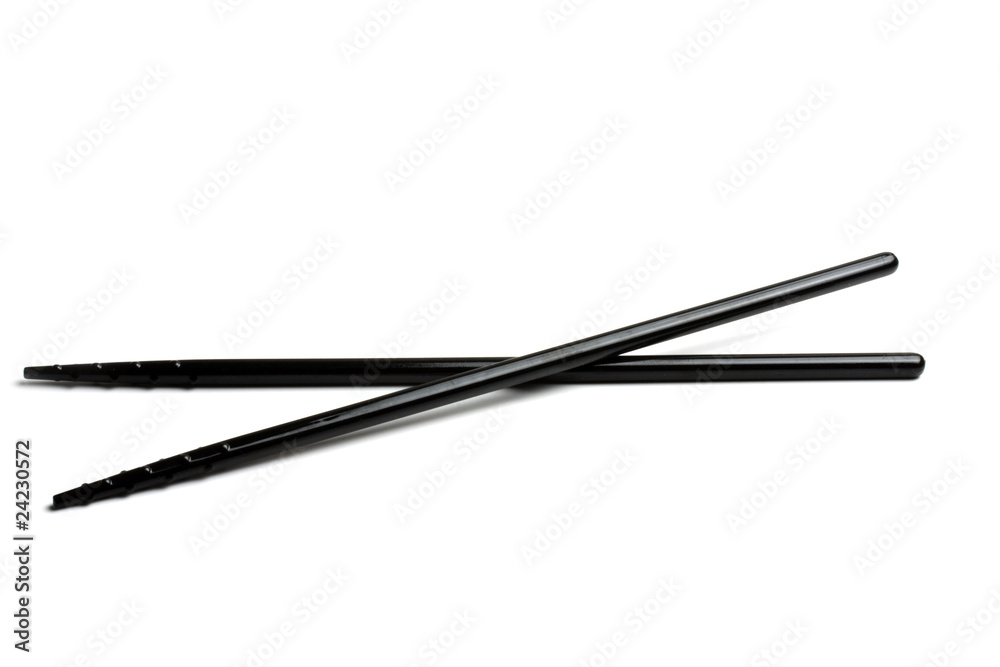 Black chopsticks isolated on white background Black chopsticks isolated on white background