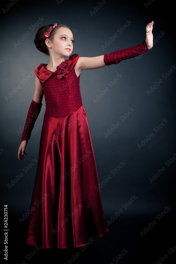 Young girl posing on black background Young girl posing on black background