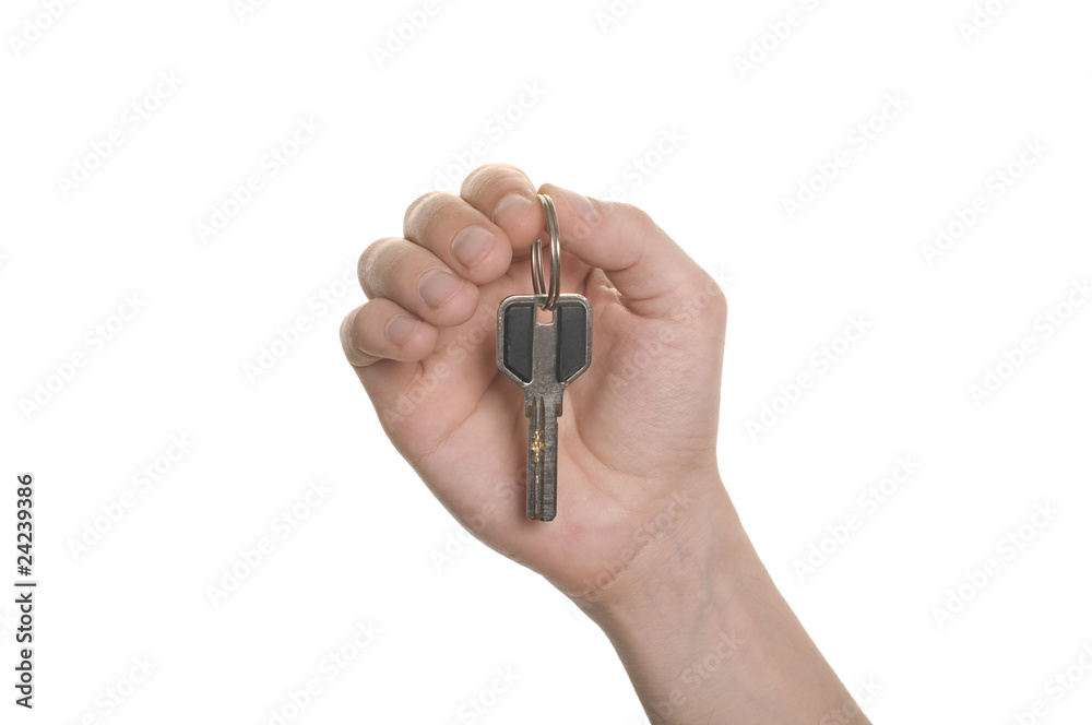 business man hand with a key isolated over white business man hand with a key isolated over white