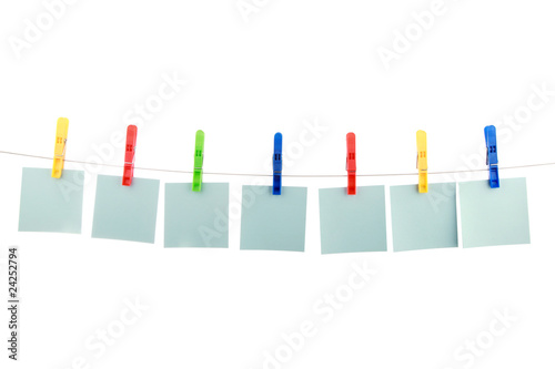 seven colour cards hang on clothespins