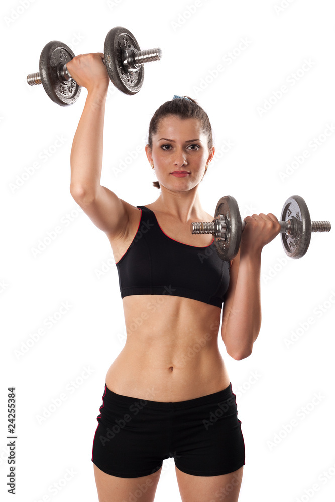 Obraz premium Woman doing fitness with weights