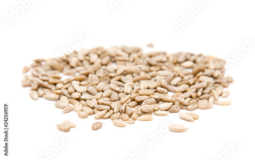 handful of sunflower seeds isolated on white