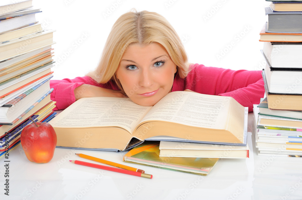 young pretty tired student girl with lots of books in panic. iso young pretty tired student girl with lots of books in panic. iso
