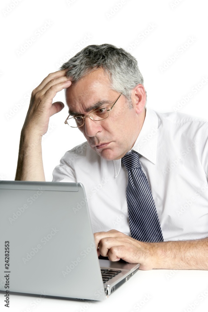 senior businessmen focused on laptop work senior businessmen focused on laptop work
