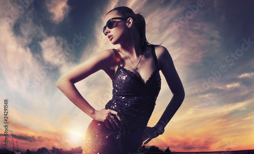 Perfect fashionable lady wearing sunglasses photo