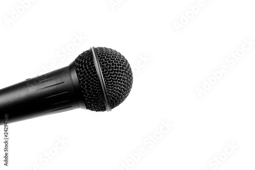 Obraz na płótnie A black microphone isolated on white