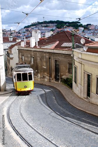 Typical old tram in a street of Lisbon. Portugal.