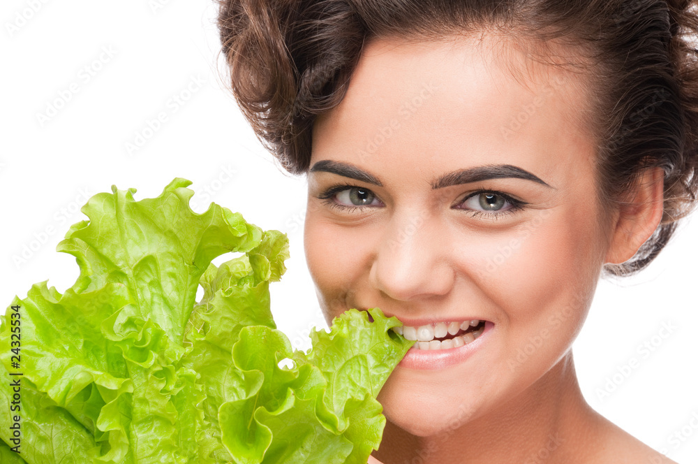 Closeup portrait of emotional beauty woman with green lettuce Closeup portrait of emotional beauty woman with green lettuce