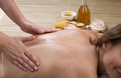 Photography Spa.Young woman getting a massage