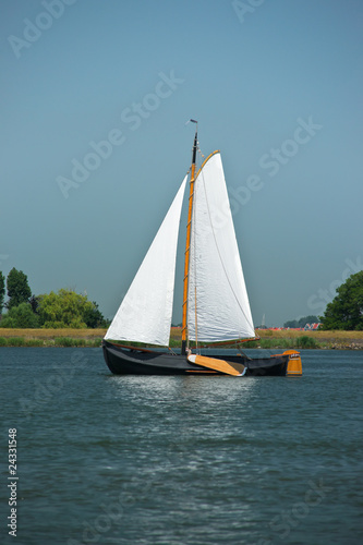 Lonely traditional netherlands sailing boat