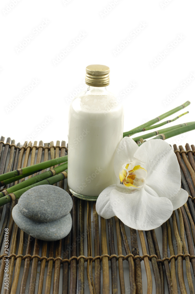 Tropical spa –orchid and lotion with stone