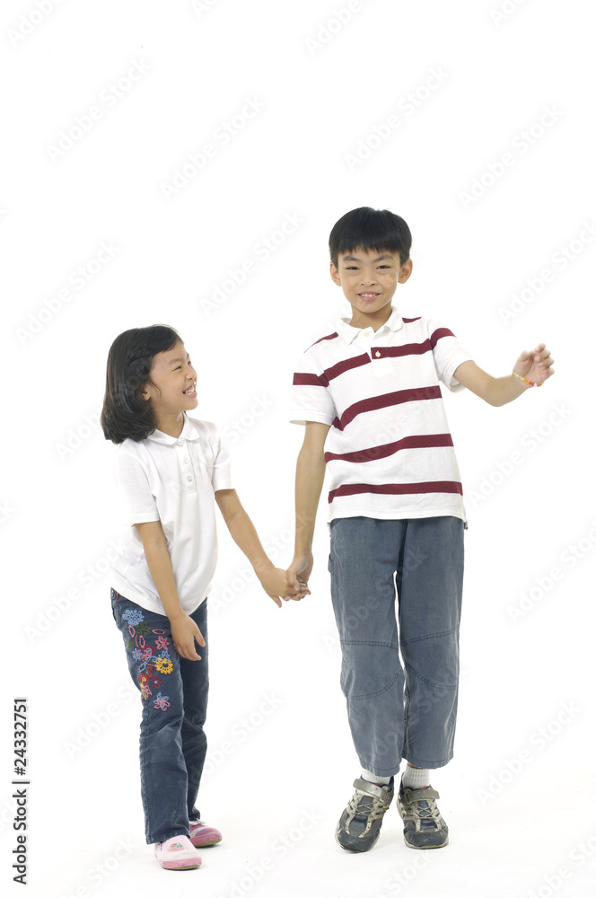 Beautiful little girl with his brother laughing. Isolated Beautiful little girl with his brother laughing. Isolated